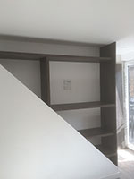 A custom shelf built into the wall